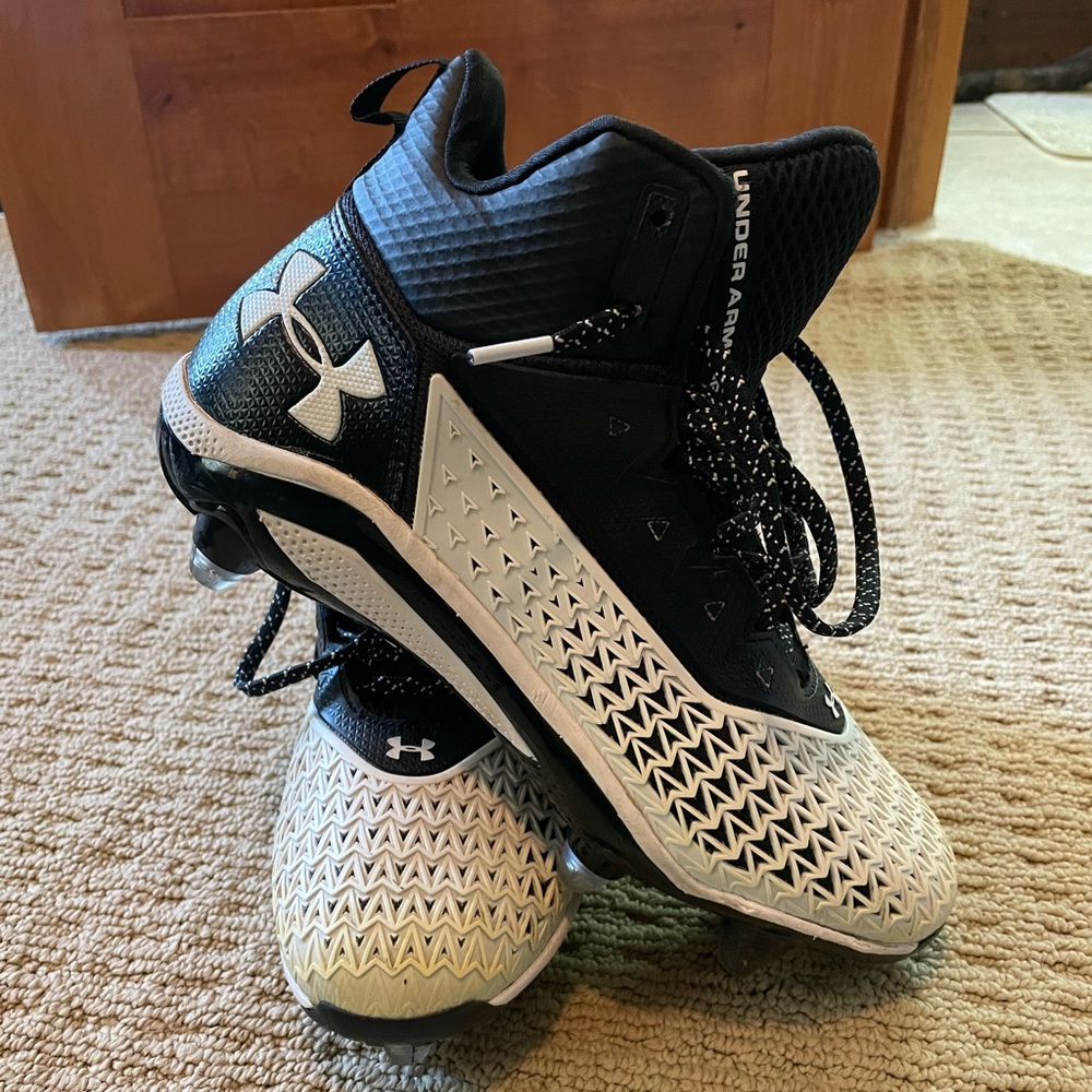 Mens black and white football cleats